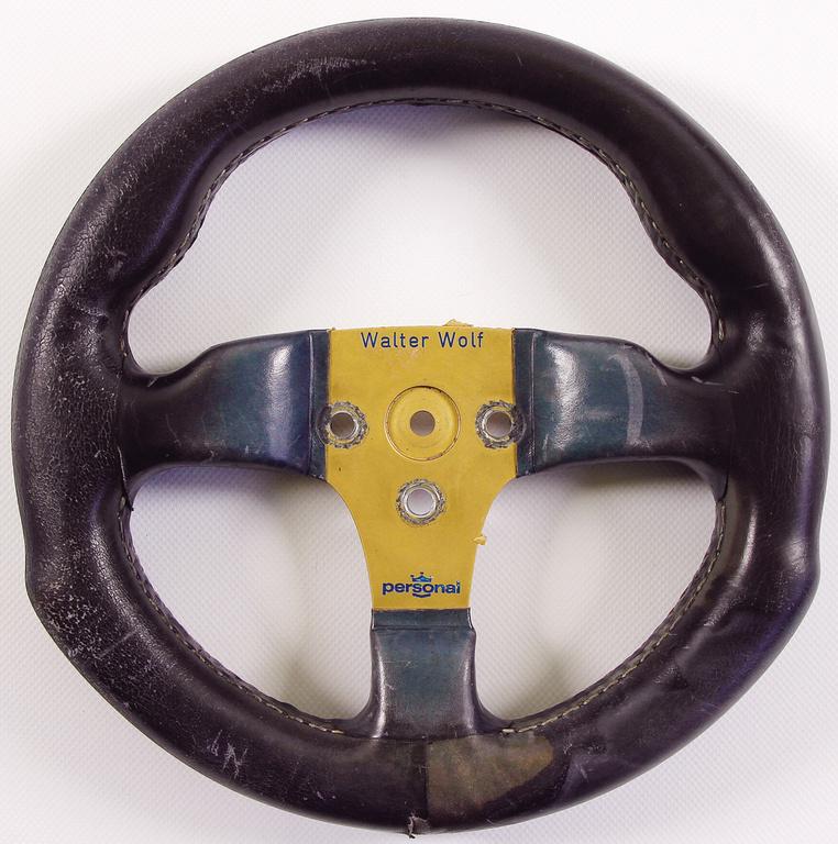WALTER WOLF RACING original F1 steering wheel Walter: WALTER WOLF RACING original F1 steering wheel Walter Wolf Racing (staff), probably 1979 (Hunt/Rosberg), race used German Description Walter Wolf Racing original F1 Lenkrad Walter Wolf Racing (Personal