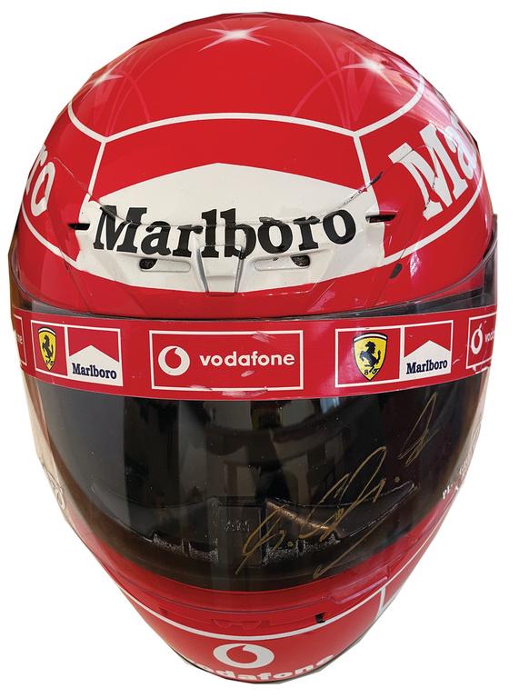 MICHAEL SCHUMACHER/FERRARI replika crash helmet Michael: MICHAEL SCHUMACHER/FERRARI replika crash helmet Michael Schumacher, autographed on the visor, good condition German Description Michael Schumacher/Ferrari Replika Sturzhelm Michael Schumacher, handsig