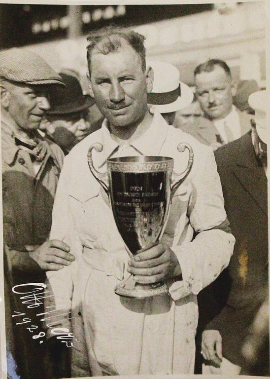 OTTO MERZ/MERCEDES BENZ Grand Prix of Germany 1927,: OTTO MERZ/MERCEDES BENZ Grand Prix of Germany 1927, autographed B/W photo, Otto Merz with the winner's cup, Merz won ahead of his teammates Christian Werner, both in a Mercedes Benz type S, 24x18cm, e