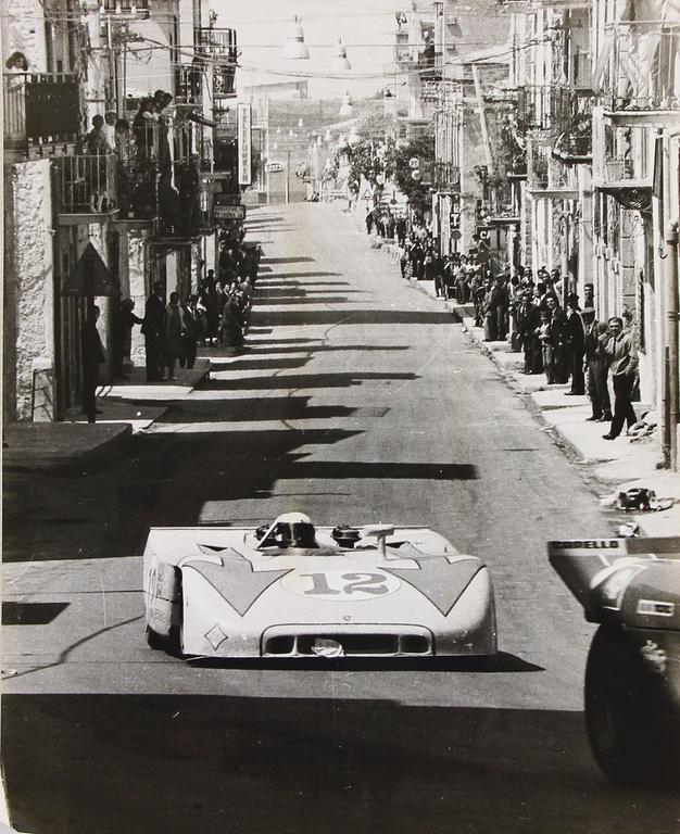 PORSCHE original B/W photo Jo Siffert/Brian Redman in a: PORSCHE original B/W photo Jo Siffert/Brian Redman in a Porsche 908 Targa Florio 1970, reverse stamped "Gulf Photograh", 25x20.5cm, good condition German Description PORSCHE Original s/w Aufnahme Jo S