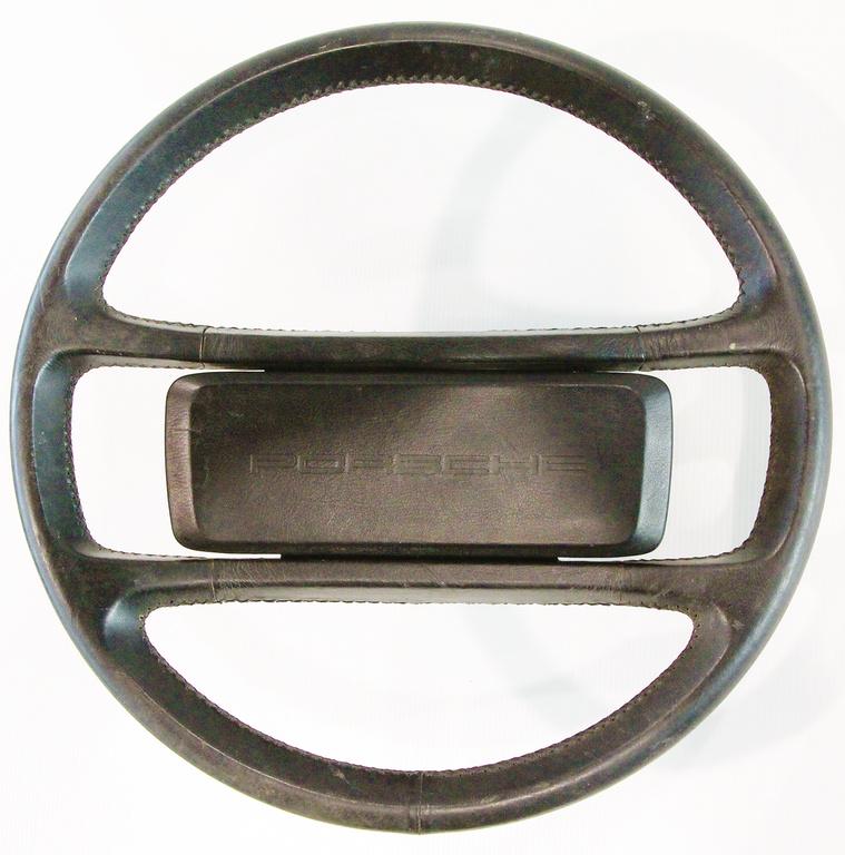 PORSCHE leather steering wheel for Porsche 911/930: PORSCHE leather steering wheel for Porsche 911/930 Turbo, part number 911.347.084.09, with horn button part number 911.347.859.01, with a diameter of 38cm, good used condition German Description PORSC