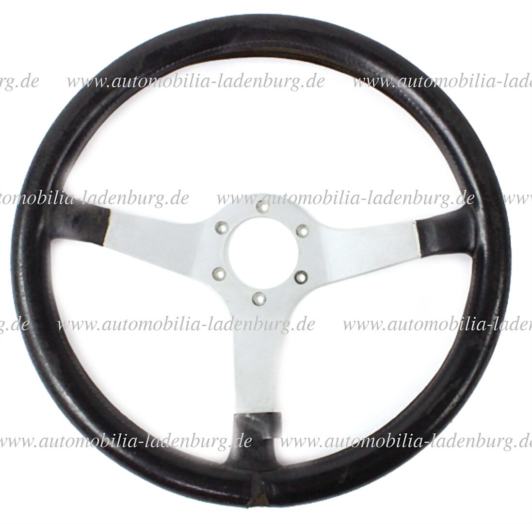 FERRARI / MOMO 1972-1976, leather steering wheel (MOMO) for Ferrari 365 / 308 German Description: FERRARI / MOMO 1972-1976, leather steering wheel (MOMO) for Ferrari 365 / 308 German Description FERRARI / MOMO 1972-1976, Lederlenkrad (MOMO) für Ferrari 365 / 308