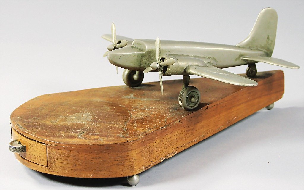 desk model plane on a wood base with drawer, '30s: desk model plane on a wood base with drawer, '30s, two engines, 31 x 24.5 x 12 cm German Description Schreibtischmodell Flugzeug auf Holzsockel mit Schublade, 30er Jahre, zweimotorig, 31 x 24,5 x 12 c
