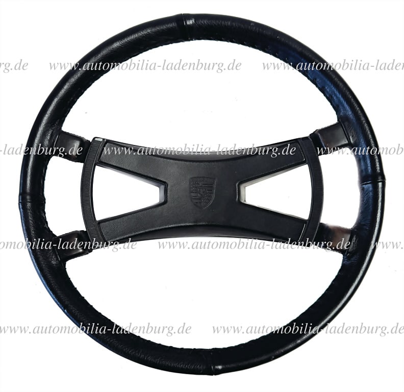 PORSCHE Leather steering wheel for Porsche 911 with VDM stamp, dated (1/71) and baffle plate,: PORSCHE Leather steering wheel for Porsche 911 with VDM stamp, dated (1/71) and baffle plate, diameter 42cm German Description PORSCHE Lederlenkrad für Porsche 911 mit VDM Stempel, datiert (1/71)