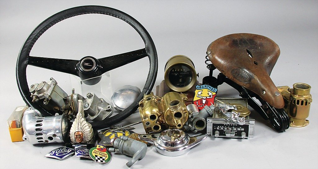 mixed lot of 20 pieces, among them carburetor, brass, p: mixed lot of 20 pieces, among them carburetor, brass, probably from the '20s, suction funnel, nickel-plated; bike/motorbike saddle Primus; car radio Voxson; gas cap two-stroke oil/gasoline Auto-Union;