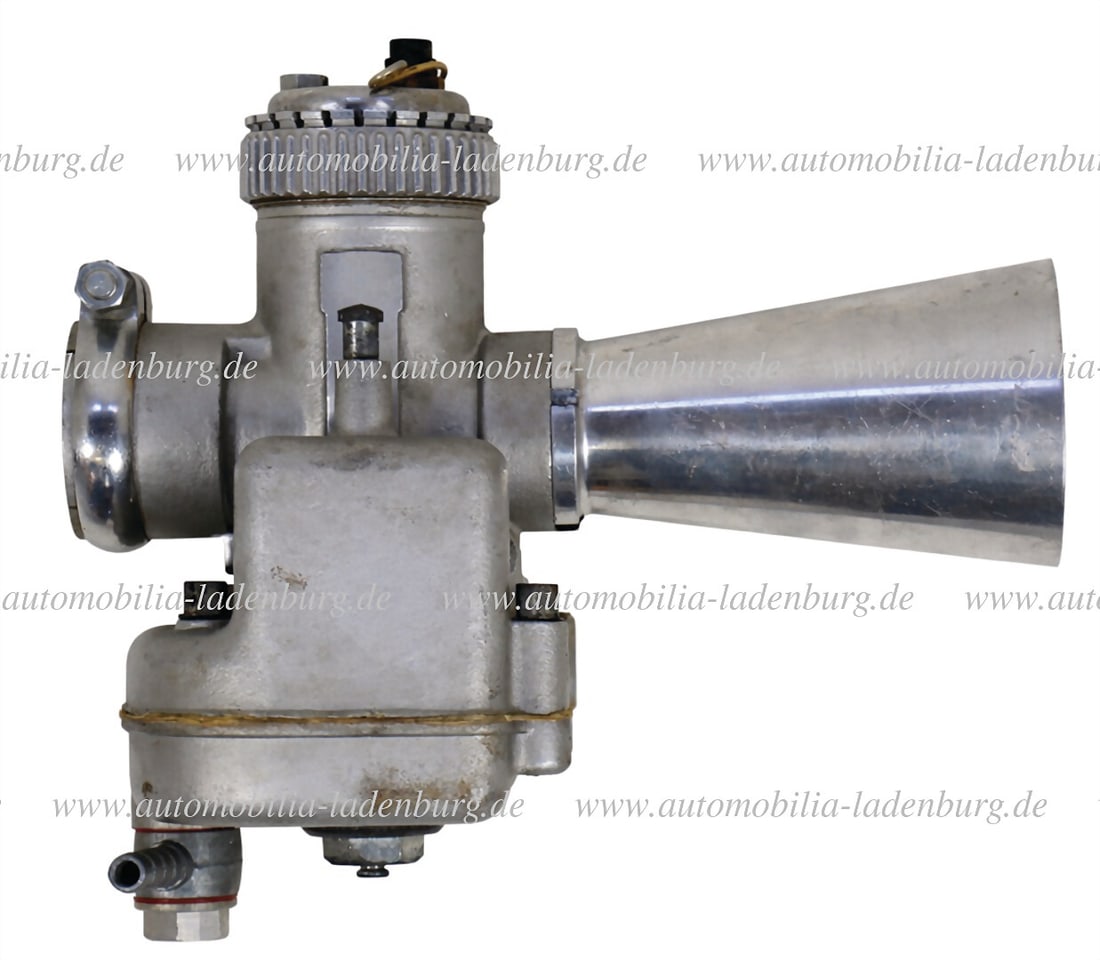 DLLORTO 35mm. Dell`Orto racing carburetor "SSI. 35 B", with double float chamber "SS C" & intake: DLLORTO 35mm. Dell`Orto racing carburetor "SSI. 35 B", with double float chamber "SS C" & intake funnel, very good condition German Description DLLORTO 35mm. Dell`Orto Rennsportvergaser "SSI. 35 B", m