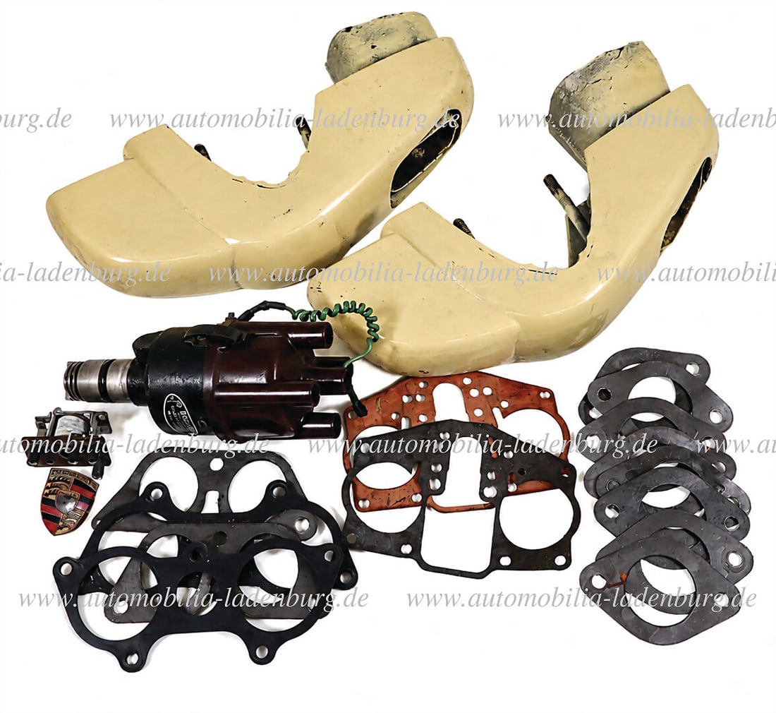 PORSCHE Mixed lot, including a pair of bumper horns for Porsche 356 B/C incl. tailpipes, good used: PORSCHE Mixed lot, including a pair of bumper horns for Porsche 356 B/C incl. tailpipes, good used condition; Bosch ignition distributor part no. 0231129022, used condition; a pair of gaskets, small P