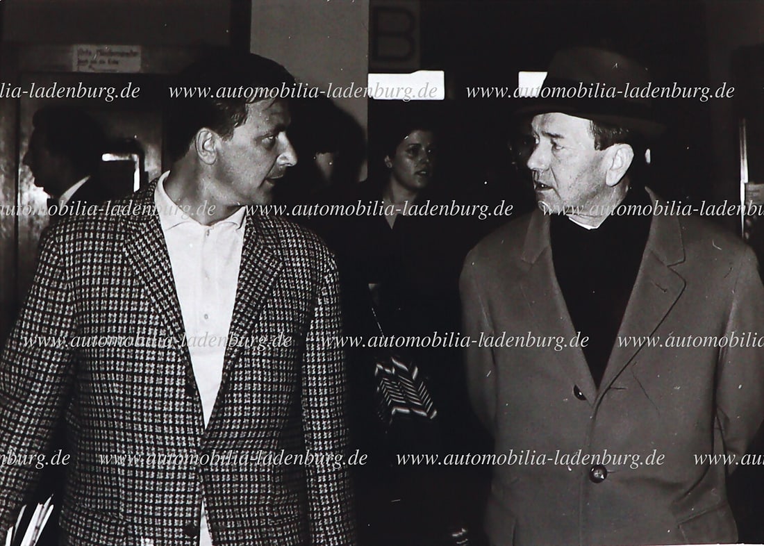 HANS HERRMANN Ca. 1966, original b/w photograph, Hans Herrmann in conversation with Ferry Porsche, (1 of 2)