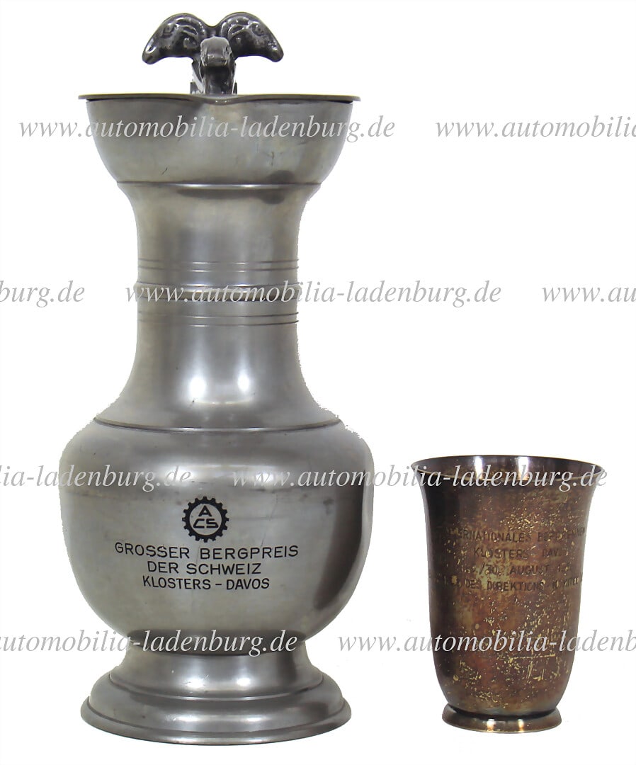 HANS HERRMANN 30.08.1959, mixed lot of 2 pieces, including winner's cup / pewter jug "Grosser: HANS HERRMANN 30.08.1959, mixed lot of 2 pieces, including winner's cup / pewter jug "Grosser Bergpreis der Schweiz Klosters-Davos", height 26.5cm, plus silver cup (silver 800), "Internationales Bergr
