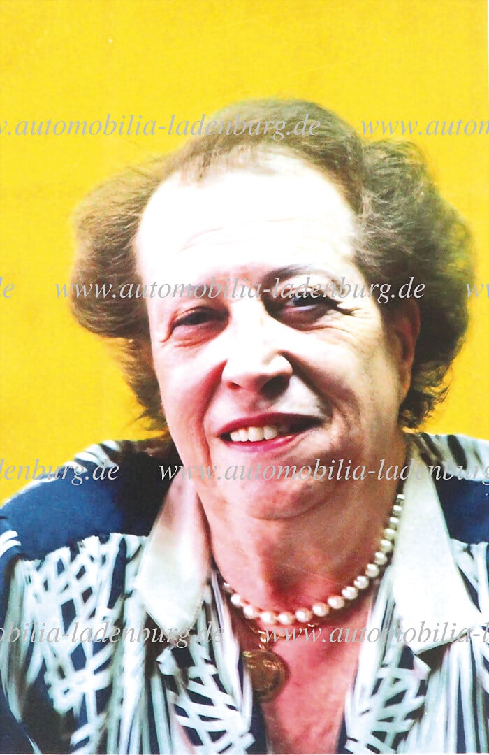 FERRARI Color photograph, Mrs. Lina Lardi (mother of Piero Ferrari), in the office of Enzo Ferrari (1 of 2)
