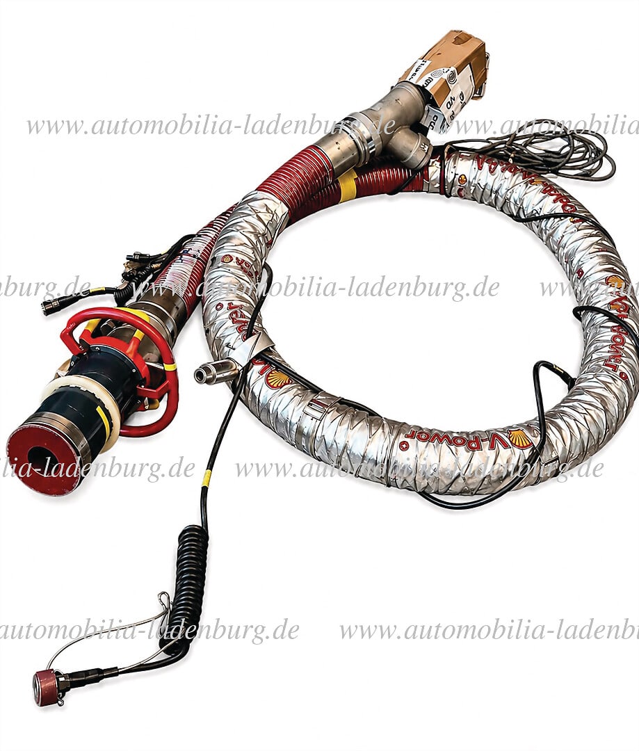 FERRARI Comprising original Ferrari F1 fuel hose (P/N 174-0321 / S/N 010301); "Trabes" transport (1 of 6)