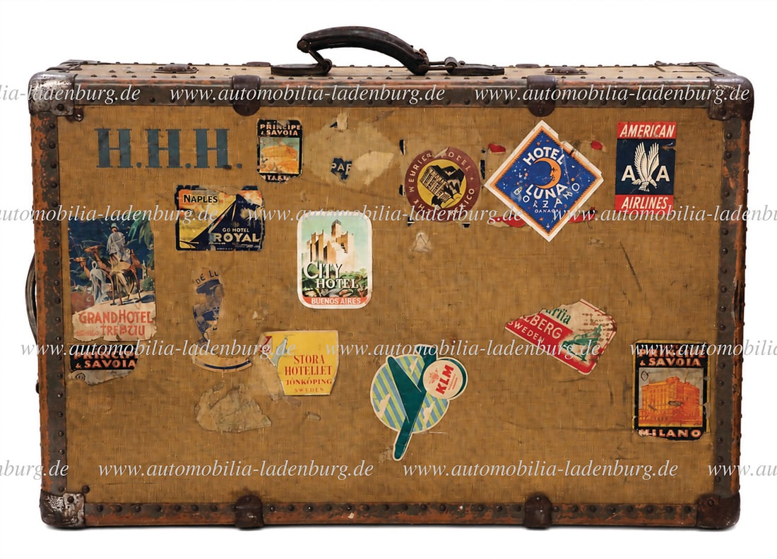 ESTATE OF HANS HUGO HARTMANN Personal suitcase with the initials H.H.H. and numerous hotel stickers, (1 of 3)