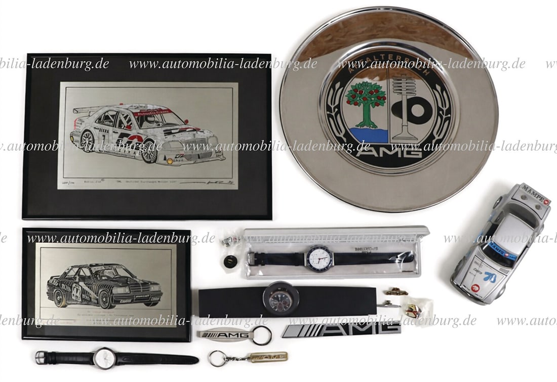 MERCEDES-BENZ / AMG Mixed lot including WMF wall plate "Affalterbach AMG", diameter 31.5cm; 2 pewter: MERCEDES-BENZ / AMG Mixed lot including WMF wall plate "Affalterbach AMG", diameter 31.5cm; 2 pewter graphics by Andreas Hentrich "AMG 2,3 16V - Gr.A 1988", limited edition 007/101, 16x24cm; "AMG Germ