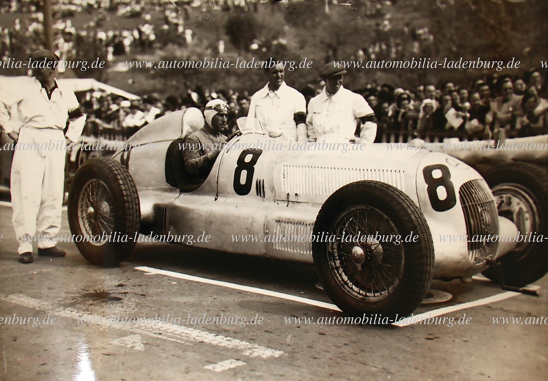 MERCEDES-BENZ Original b/w photo Luigi Faglioli on Mercedes-Benz W25B, GP Spain San Sebastian 1935,: MERCEDES-BENZ Original b/w photo Luigi Faglioli on Mercedes-Benz W25B, GP Spain San Sebastian 1935, 17x24cm, stamped "Fotocar San Sebastian" German Description MERCEDES-BENZ Original s/w Aufnahme Luig