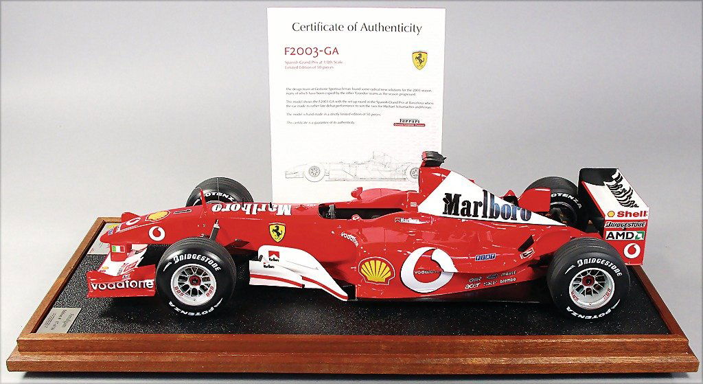 FERRARI handiwork model F2003-GA, limited Edition 17/50: FERRARI handiwork model F2003-GA, limited Edition 17/50, manufacturer Amalgam Fine Model Racing Cars, with certificate, in original showcase, scale 1:8, very high-quality work, length 57 cm, condition