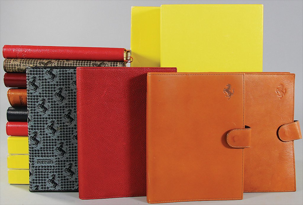 FERRARI mixed lot of 18 appointment book of the years: FERRARI mixed lot of 18 appointment book of the years 1979/80/83/84/85/86/87/89/91/92/93/94/96/97/98/99 and 2001, 2001 with card by Piero Ferrari, 8 appointment books in original box German Descriptio