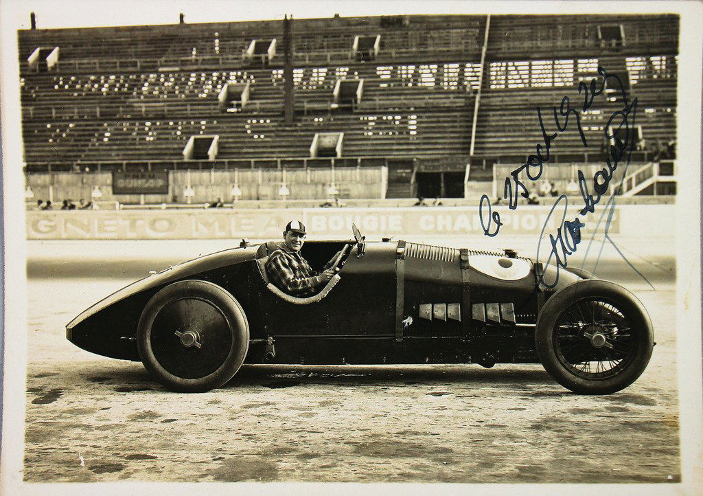 VOISIN autographed original B/W photo M. Marchand on: VOISIN autographed original B/W photo M. Marchand on the steering wheel of his 12-cylinders Voisin Rekord-car, 13 x 18 cm, with blue ink autographed by Marchand, very rare German Description VOISIN Ha