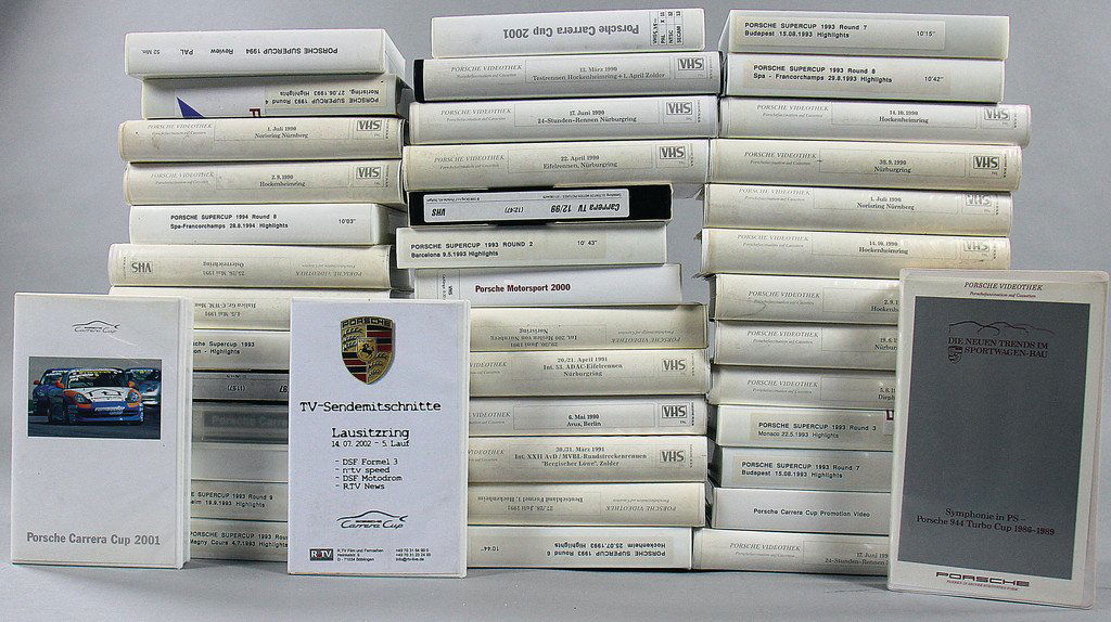 PORSCHE Mixed lot of 46 pieces, 45 video cassettes and (1 of 1)