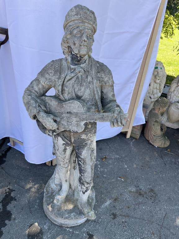 Concrete Matador playing Guitar Garden Statue: Concrete Matador playing Guitar Garden Statue- 44” T x 16” W
