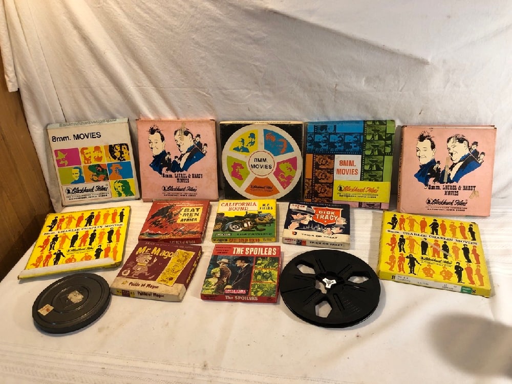 Vintage 8mm Film Reels: Vintage 8mm Film Reels including Bat Meb of Africa, Mr. Magoo, The Spoilers, California Bound, Dick Tracy, Charlie Chaplin Movies, Blackhawk Films, Laurel & Hardy Movies