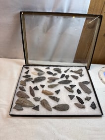 Collection of Various Arrowheads in Display Case