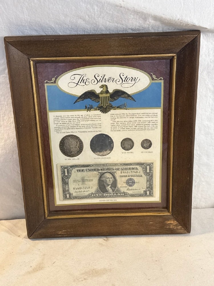Framed Coin Set Titled The Silver Story: Framed Coin Set Titled The Silver Story - Includes 1$ Silver Cert., Morgan Silver Dollar, War Nickel, Silver Dime and Silver Granules - 10 1/2” x 13 1/2” frame
