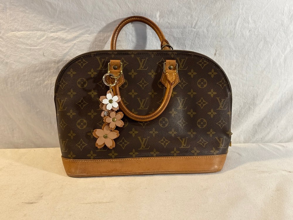 Louis Vuitton Alma PM Handbag: Louis Vuitton Alma PM Handbag - Monogram Canvas with Natural Cowhide Leather Trim and Gold Hardware ~ 14” x 9 1/2” Tall ; Bag charm included