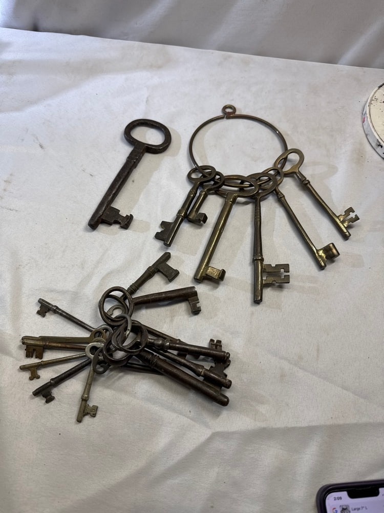 Antique Brass & Cast Iron Skeleton Keys: Antique Large Brass & Cast Iron Skeleton Keys- Range from 7” L - 3” L. 1 Marked Sargent