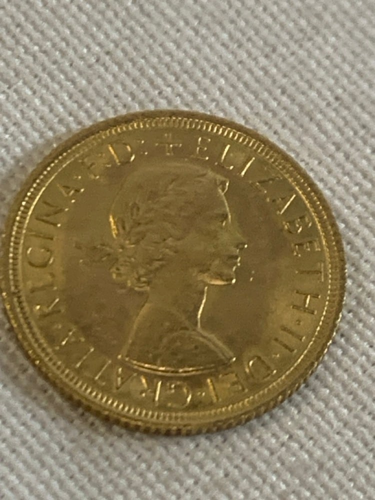 1966 British 22 Kt Gold Elizabeth II Coin: 1966 British 22 Kt Gold Elizabeth II Sovereign Coin- weight 7.98 Grams