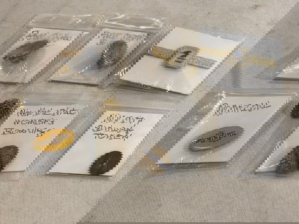 Vtg. Buttons, Pins, Tokens and Tie Clasp: Vtg. Buttons, Pins, Tokens and Tie Clasp including Post office button, Fire Dept. Button, USPS Tie Clasp, Pennzoil Pin, NYS Women’s Bowling Pin and NYC Subway Token