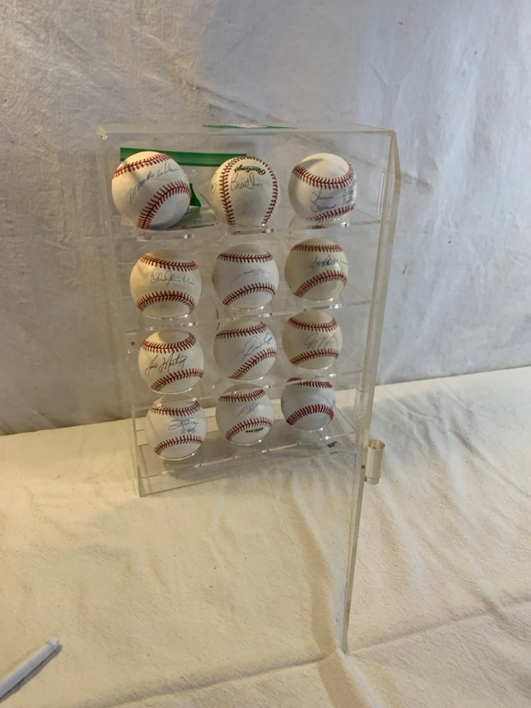 Signed Baseball Collection in Lucite Storage Display: Signed Baseball Collection in Lucite Storage Display including Mookie Wilson, Tino Martinez, Andy Laroche, Aaron Boone,Chris Chambliss, Brent Strom, Reggie Jackson,Jim Palmer HOF90, Shane Spencer,