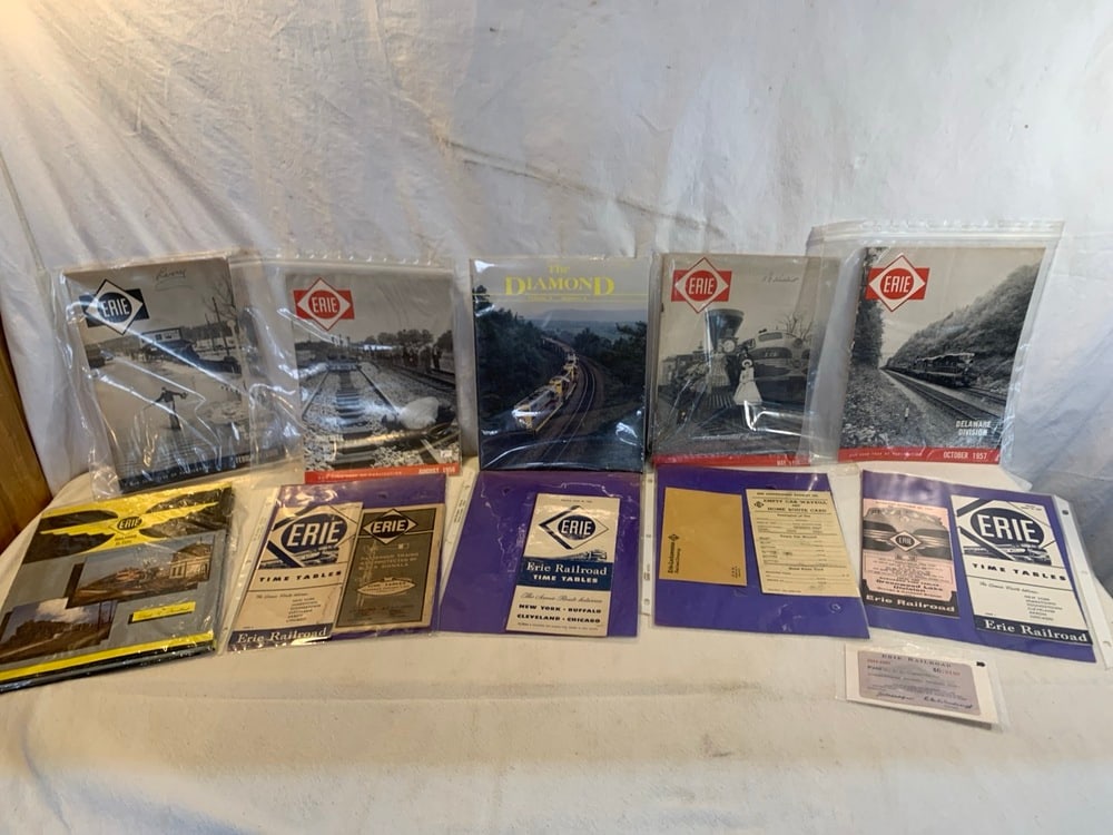 Erie RR Memorabilia: Erie RR Memorabilia including Time Tables, Waybill, Pass, 1950’s Magazines, & Book