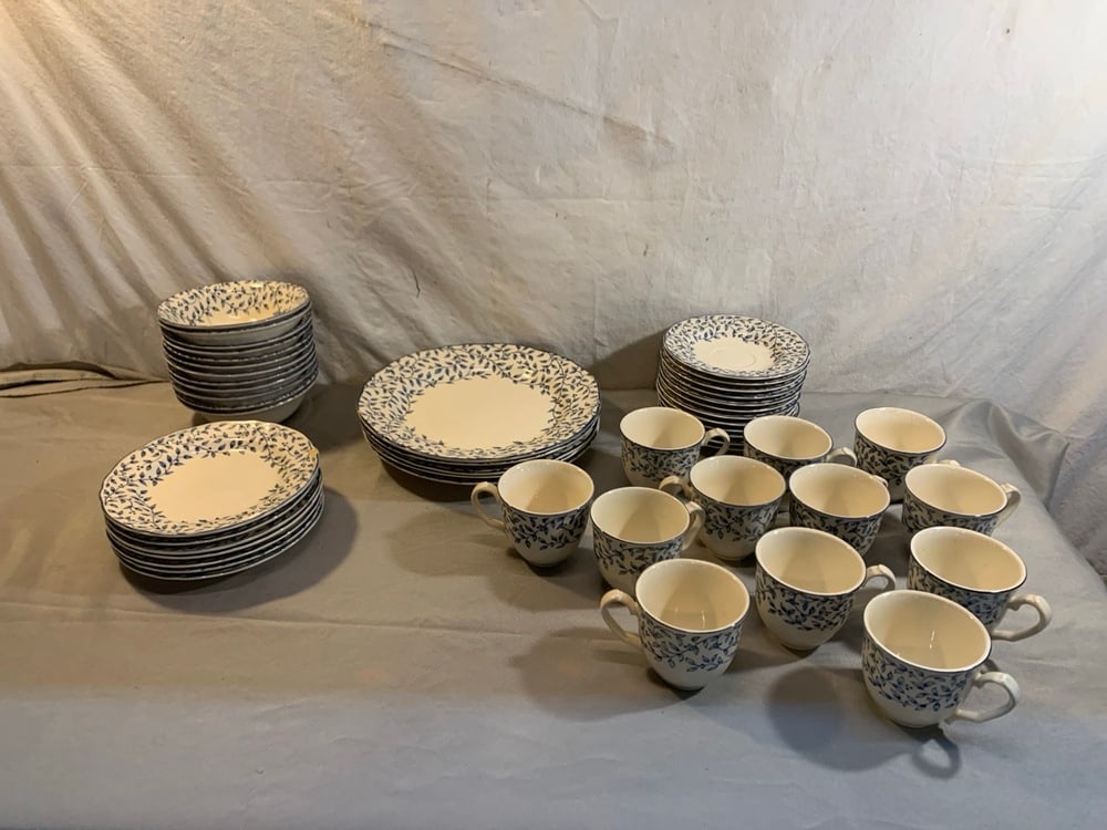 Vtg Table matesStoneware Dishes: Vtg Table mates Sylvan by Nikki Stoneware Dishes 5) 10” Plates(1 chip), 7) 7 1:4” Plates(3 chips), 12) 6” Bowls(1 crack), 12) 6” Saucers, 12) Cups(3 Chips)