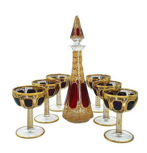 Bohemian Moser champagne glass set with decanter. 19century Moser Cabochon Ruby Glass champagne: 19century Moser Cabochon Ruby Glass champagne glass / Flute covered in 24k gold set of 6 and Decanter