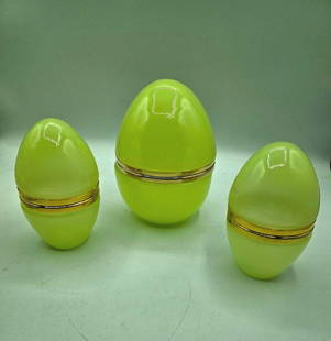 Antique French Opaline Uranium Glass Egg Shaped Boxes, Set of 3.: Antique French Opaline Uranium Glass Egg Shaped Boxes, Set of 3.Very unusual opaline uranium glass egg shaped boxes.Polished bronze mounts.Largest egg measures 17cm high and 11cm wide.Pair of smaller