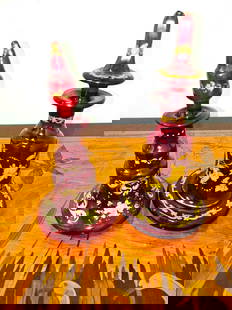 Pair of Bohemian glass perfume bottles in ruby: Pair of nice perfume bottles in ruby colour.1840-1860thHeight:18 and 19cmGood condition,some wear.