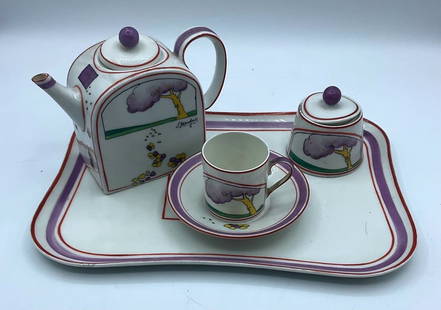 L. Margerie and P. Bastard, Paris (publisher): Porcelain Solitaire Coffee Service: Small Tea or Coffee service for one person. Made by P. Bastard of Paris and signed by the artist E. Margeris, it features a hand-painted Art Deco design and an unusual shape.The design house of P.Bast