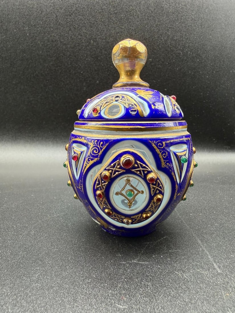 Antique Bohemian overlay glass Bonbonniere with lid decorated with red and green stones,Ottoman: Very unusual 19century Bohemian Oberlay glass covered Bonbonniere made for Turkish,Arabic market. Bonbonniere is beautifully decorated with gilding and stones.Measures:12cm high,6cm width across the r
