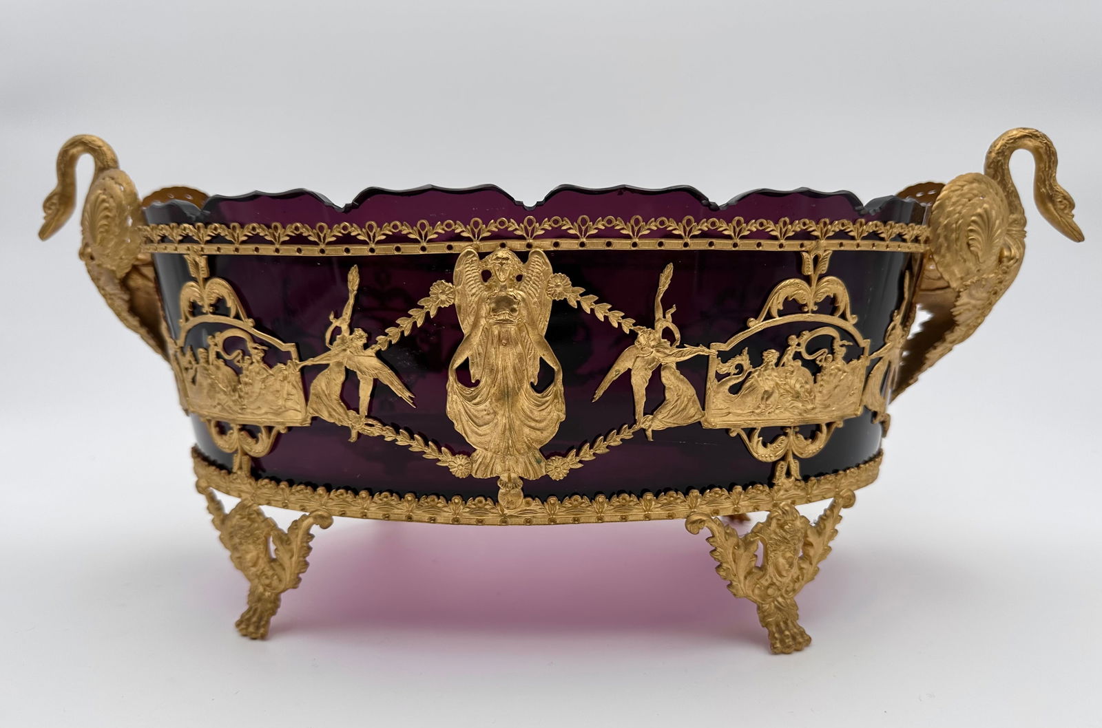 Napoleon III Antique Amethist glass jardiniere: Wonderful XIX century French jardiniere in dark amethyst. Gilt bronze mounted with moulded myphological scene. Condition:Perfect Measures: 36/16 cm Provenance: private french collection.