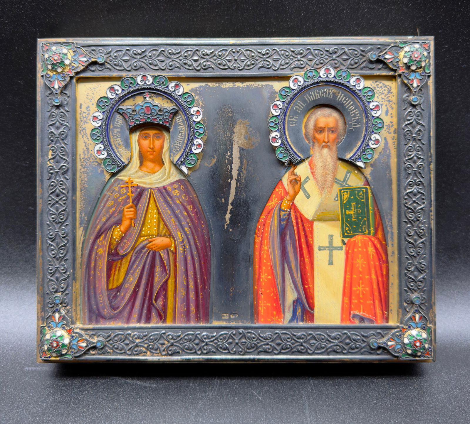 Antique Russian Silver enamel icon depicting St.A.exandra and Apostle Pavel: Antique Russian Silver enamel icon depicting St.A.exandra and Apostle Pavel.Icon is very rare.Condition: Very good.Marks: 84 standard silver hallmark,P.S. initials(Paul Fredrik Sohlman?)Measures:17/15