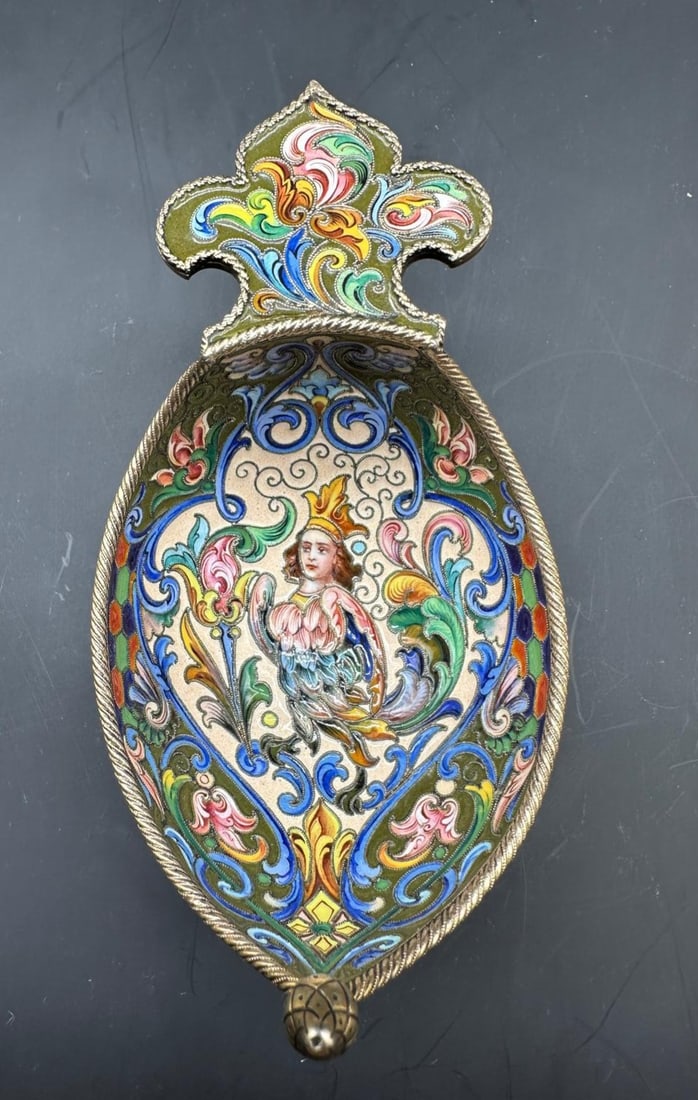 A Russian Pictorial Shaded Cloisonné Enameled Silver gilt Kovsh. Ovchinnikov, Feodor Rückert marks: Magnificent Pictorial shaded 3namel Kovsh by Pavel Ovchinnikov in Pan Slavic style in pastel colours decorated with a phoenix female in the centre in accordance with Russian folk culture surrounded by