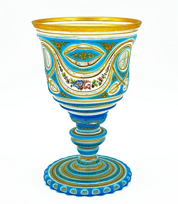 Baccarat overlay drinking glass: Antique baccarat overlay glass 24k gold decor with turquoise enamelling and floral garland bouquets. Typical item for Middle East/Ottoman market interest Date:1850th