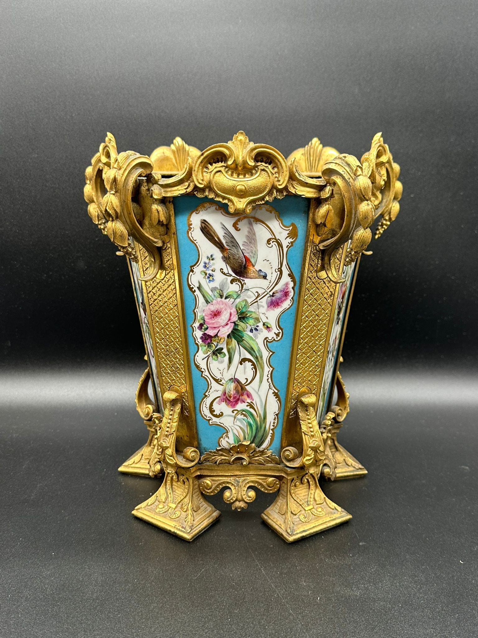 Russian Imperial Porcelain cache pot,Nicholas I period,marked: Exclusive Russian Imperial Porcelain hand painted cache pot gilt bronzed.Beautifully decorated with painted floral and bird decoration.Measures:H:27cmWidth across the rim:22cmMarks: Underglazed blue m