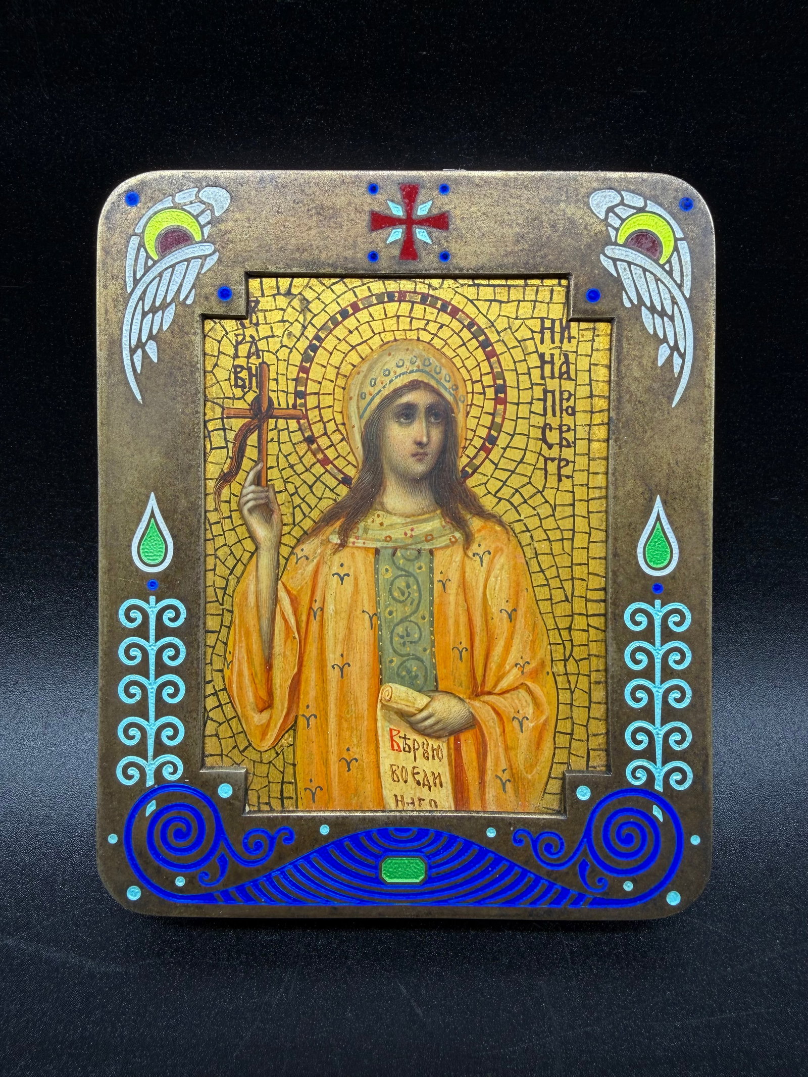 Russian Silver champlevé enamel basma icon of St.Nina ,1st Moscow Artel.Art Nouveau: Russian Silver champlevé enamel basma icon of St.Nina ,1st Moscow Artel.Art NouveauCondition:Very good.Measures:12.5/9.5cmMarks:standard silver 84 hallmark with minevra head turned towards 84.1MA(1st