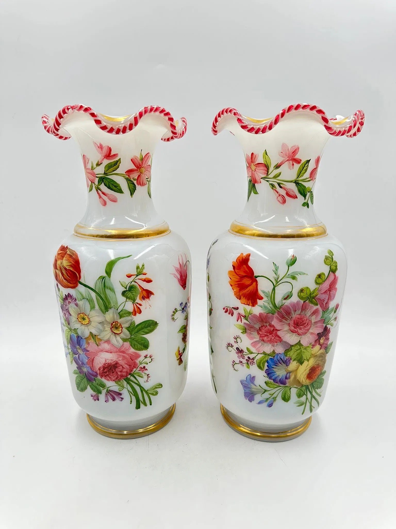 Baccarat Pair of Large Opaline Vases With Floral Decoration, By Jean-francois Robert: Description:A pair of white opaline bulle de savon baluster vases, beautifully painted with bouquets of flowers, the necks adorned with twisted glass. Work of the Baccarat factory between 1835 and 184