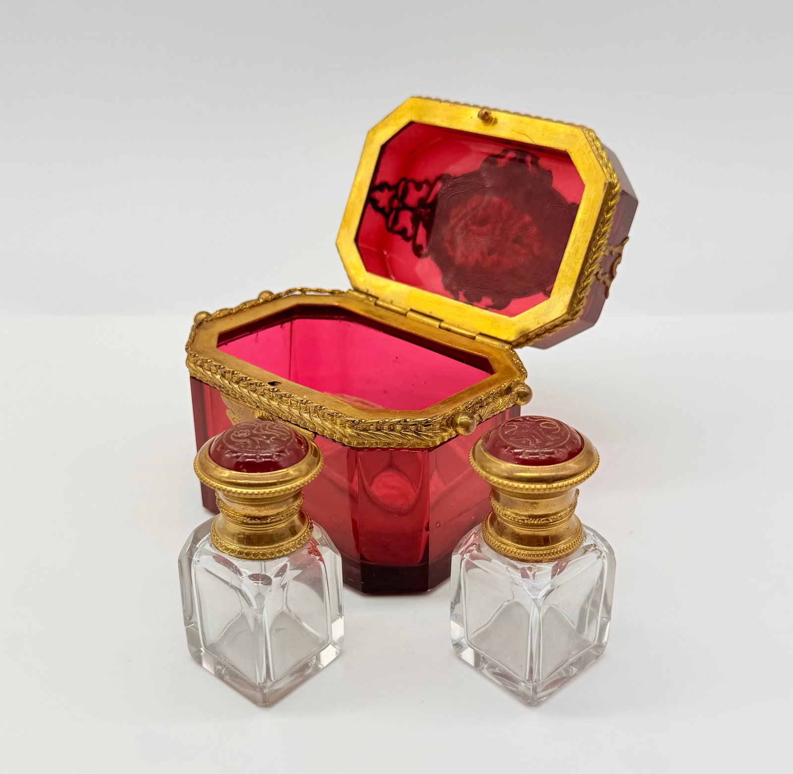 Extraordinary Antique Bohemian Glass casket with an oval miniature medallio: Box includes pair of perfume bottles.Date:1840-1860Condition:Perfect,free of damage