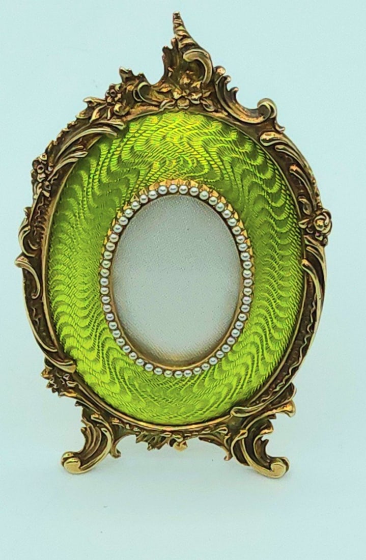 Faberge Russian Silver Gold Plated Guilloche Enamel Photo Frame, Mint Green Enamel With Pearls: Beautiful antique Russian enamel silver gold plated picture frame.Hallmark: 925 and Cytilic stamp "VKGI"other brands: 900 (999?) VKGIRegistered inventory number: 124MeasurementsHeight:12cmWidth: