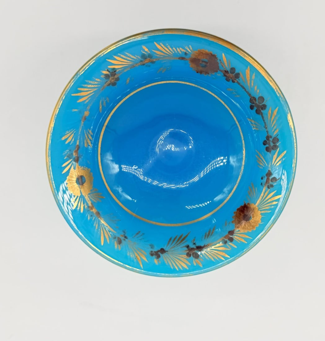 CharlesX French blue Opaline Tazza bowl,Desvignes decor: An opal crystal coupe in ultramarine blue.It rests on a pedestal,adorned with a gold frieze.Excellent condition; a Bercy factory from the Charles X period.Height: 8cm. Width: 11,5cm. Good condition,fr