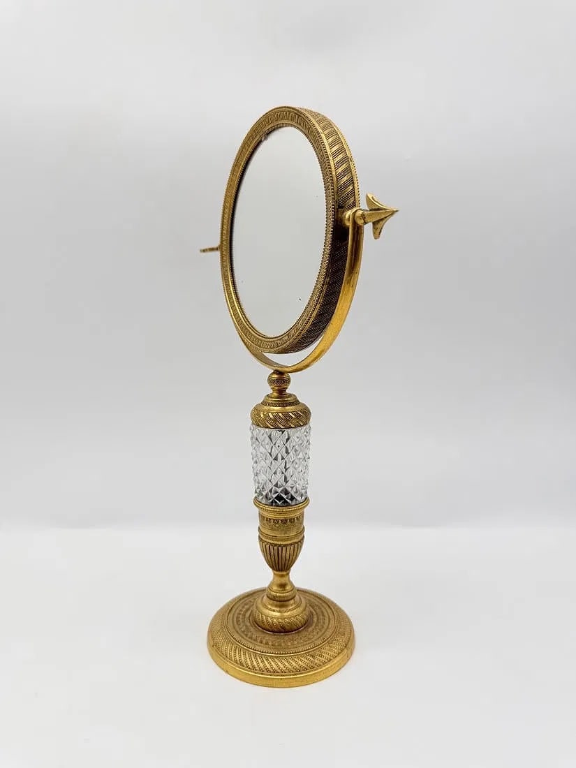 Baccarat glass gilt bronze table mirror, Empire-Restoration period: Gilt bronze table mirrorEmpire period - Restoration periodFirst quarter of the 19th centuryXIXcentury French Baccarat glass mirror.Very good condition.