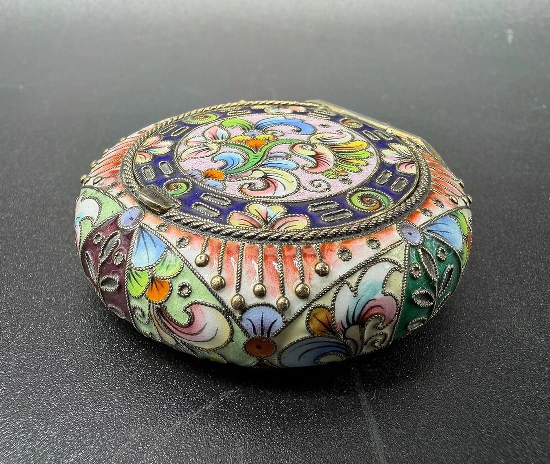 Antique Russian shaded polychrome Enamel Box,6th Artel,Provenance Christie's: Wonderful shaded polychrome enamel Russian box by 5 Moscow artel.Decorated with flower sprays and swags in pinks, greens, blues and other pastel colours.Date:1908-1917Marks:6Moscow ArtelMeasures:5cm w